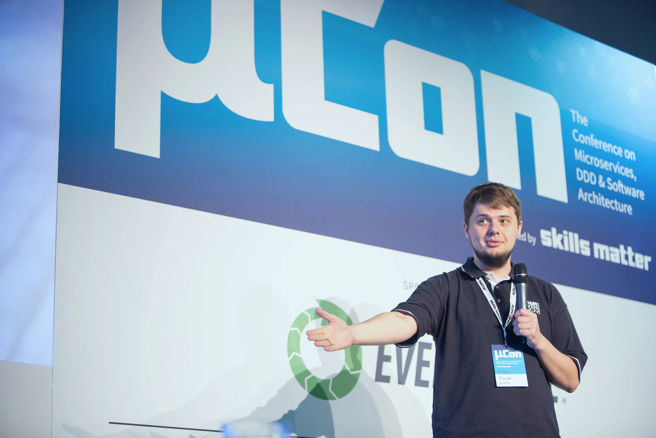 Kacper Gunia speaking at a Skills Matter conference